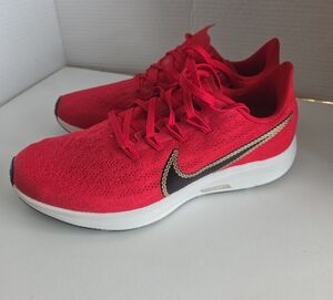 Nike Women's Red Sneakers with Black Swoosh